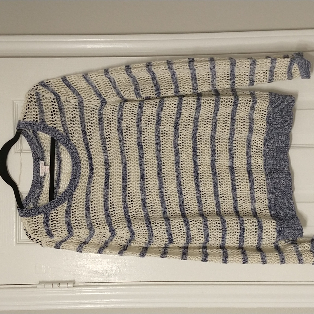 Blue and white loose knit sweater